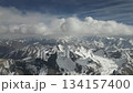 Majestic mountain landscape with clouds, camera pans across the scene 134157400