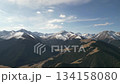 Majestic mountain landscape with snow-capped peaks, camera pans across scene 134158080