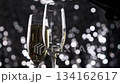 Pouring Champagne Wine on shine background. 134162617