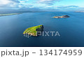 Aerial View of a Green Island in the Blue Ocean 134174959