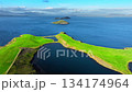 Aerial View of a Green Island in the Blue Ocean 134174964