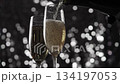 Pouring Champagne Wine on shine background. 134197053