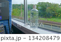 電車からの風景とペットボトル 134208479