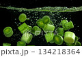 Sliced leeks fall under water. Filmed on a high-speed camera at 1000 fps. High quality FullHD footage 134218364