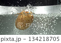 The potatoes fall under the water into a saucepan. Filmed on a high-speed camera at 1000 fps. High quality FullHD footage 134218705