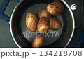 Potatoes fall into a pot of water. View from above. Filmed on a high-speed camera at 1000 fps. High quality FullHD footage 134218708