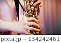 Extreme close-up of a person playing the soprano saxophone: Film look 134242461