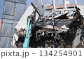 Demolition work using a large-scale splitter: An old reinforced concrete building 134254901