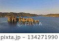 4K Video Overflight Of Volcanic Cliff Island Near Rocky Coastline 134271990