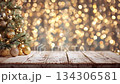 Christmas tree with golden ornaments on rustic wooden background 134306581