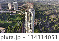 Green Parkland Skyline With Lone Tower, Aerial Reveal Of Slender Residential Skyscraper Rising Above Golf 134314051