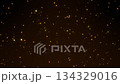 Abstract Background With Golden Floating Particles And Warm Glow. 134329016