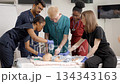Medical students practicing pediatric resuscitation training on a manikin 134343163
