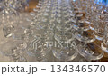 Rows of inverted crystal wine glasses create an elegant abstract glassware background video Rows of inverted crystal wine glasses create an elegant abstract glassware background video 134346570