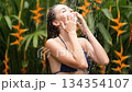Woman Takes Shower in Nature 134354107