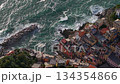 Fishing Village of Riomaggiore at sunset, Aerial View in Cinque terra coast in Italy, Italian riviera in Liguria. 134354866
