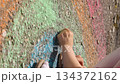child hand drawing chalk asphalt, child kid childhood dream, little artist playground park girl daughter, summer sidewalk chalk, imagination play, colorful pavement design, individual play drawing 134372162