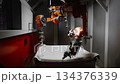 Automated Robotic Device Diligently Shaping And Refining Plastic Surfaces During Manufacturing Process 134376339