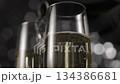 Pouring Champagne Wine on shine background. 134386681