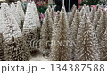 Mini Decorative Christmas Trees with Snow Effect 134387588