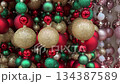 Red Green and Gold Christmas Bead Garland Close-Up 134387589