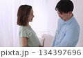 Smiling young couple and pregnant woman Smiling young couple and pregnant woman 134397696