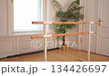 Empty ballet dance studio with barre. Professional ballet barre for stretching practicing dancing positions in dance school Dance hall ready for ballet class training. Ballet school 134426697