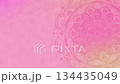 Pink tie-dye background with rotating mandala art 134435049