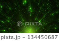 A bright abstract field with a green glow, spreading rays, and small glowing dots. The center has a stronger glow, with scattered sparks and streaks of light. 134450687