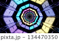 Seamless loop of flying through a futuristic octagonal tunnel with glowing cyan and purple neon panels 134470350