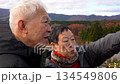 Happy senior couple travel in Autumn Winter Japan fun retirement trip experience 4k 134549806