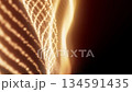 Abstract golden particle waves flowing softly across a dark background 134591435