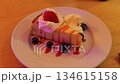 Vibrant cheesecake with berries shown, Picture of fruity cheesecake slice with decorative toppings Vibrant cheesecake with berries shown, Picture of fruity cheesecake slice with decorative toppings 134615158