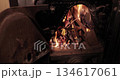 Fire in a wood stove furnace 134617061