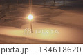 A night road covered in heavy snow and the silence of street lights 134618620