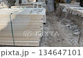 Stack of marble slabs in construction site with light shadow, suitable for textured background video 134647101