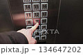 Lift buttons in a tall building elevator 134647202