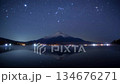 Timelapse of Orion setting behind Mount Fuji reflected on the surface of Lake Yamanaka 134676271