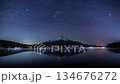 Orion Timelase sinking behind Mount Fuji reflected on the surface of Lake Yamanaka 134676272
