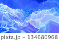 Loop 4k. Abstract waves of soft blue matte material with light inner glow and glitters on morphing surface. Abstract geometric surface like landscape or terrain, extrude or displace 3d noise. 134680968