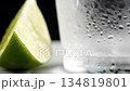 Refreshing Shot of Vodka with a Slice of Lime on a Chilled Glass, Ideal for Summer 134819801