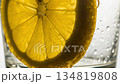 Refreshing Lemon Slices in Water: A Vibrant and Juicy Macro View of Citrus Fruits 134819808