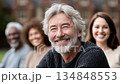 Silver-haired elderly man smiles confidently at the camera 134848553