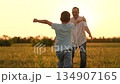 happy family, childhood dream flying, kid with male parent nature, little boy playing with his dad sunset, father playing with child at sunset, father and child interest at sunset, father enjoying 134907165