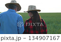 Field inspection with tablet, Agricultural progress, High-tech farmers, Future of farming, Modern fieldwork tools, Farm digitalization, Explorers of agriculture, Farming in the 21st century, Efficient 134907167