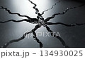 A close up view of a cracked surface with a keyboard partially visible 134930025