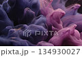 Abstract swirls of purple and pink ink with golden glitter particles 134930027