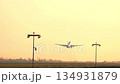 Airliner departure at sunrise. Slow motion 134931879