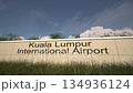 Arrivals at Kuala Lumpur International Airport with airplane landing near terminal, Kuala Lumpur, Malaysia 134936124