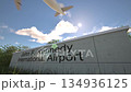 Departures at John F Kennedy International Airport with airplane leaving overhead, New York, United States 134936125